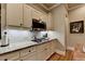 Modern kitchen featuring granite countertops, stainless steel appliances, and subway tile backsplash at 3715 Horizon Ct, Cumming, GA 30041