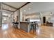 Spacious kitchen with breakfast bar, stainless steel appliances, and hardwood floors at 3715 Horizon Ct, Cumming, GA 30041