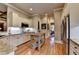 A well-equipped kitchen with granite countertops and stainless steel appliances at 3715 Horizon Ct, Cumming, GA 30041