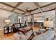 Spacious living room features coffered ceilings, recessed lights and an open floor plan at 3715 Horizon Ct, Cumming, GA 30041