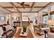Spacious living room features coffered ceilings, recessed lights and an open floor plan at 3715 Horizon Ct, Cumming, GA 30041