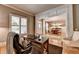 This home office features hardwood floors, natural light, and neutral paint colors at 3715 Horizon Ct, Cumming, GA 30041