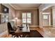 This home office features hardwood floors, natural light, and neutral paint colors at 3715 Horizon Ct, Cumming, GA 30041