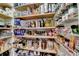 Walk-in pantry filled with shelving, perfect for storage of food and supplies at 3715 Horizon Ct, Cumming, GA 30041