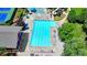 Aerial view of a resort-style swimming pool with lap lanes, a splash pad, and lounge chairs for residents' relaxation at 3715 Horizon Ct, Cumming, GA 30041