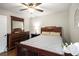 Cozy bedroom with hardwood floors, neutral paint, and natural light at 4715 Howard Dr, Powder Springs, GA 30127