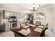 Open-concept kitchen and dining area with modern appliances, granite countertops, and ample natural light at 4715 Howard Dr, Powder Springs, GA 30127