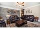 Welcoming living room with exposed brick, stylish decor, and comfortable seating at 4715 Howard Dr, Powder Springs, GA 30127