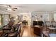 Open-concept living space seamlessly connects to the kitchen and dining area, creating an inviting atmosphere at 4715 Howard Dr, Powder Springs, GA 30127