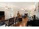 Spacious living room with hardwood floors, a fireplace, and an open floor plan at 4715 Howard Dr, Powder Springs, GA 30127