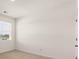 A bright bedroom with blinds covering the window at 1624 Palladian Way, Lithonia, GA 30058