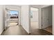 Inviting entryway with open door, showcasing view and access to a bedroom, enhancing the home's appeal at 1624 Palladian Way, Lithonia, GA 30058
