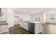 Modern kitchen with stainless steel appliances, granite countertops, and ample cabinet space at 1624 Palladian Way, Lithonia, GA 30058