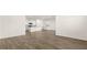 Spacious kitchen features white cabinets, stainless steel appliances, and an island at 1624 Palladian Way, Lithonia, GA 30058