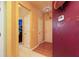 Hallway featuring unique wall decor, multiple doorways, and a view into adjacent rooms, enhancing the home's character at 1640 Donovans Nw Rdg, Kennesaw, GA 30152