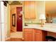 Functional kitchen featuring updated countertops and cabinetry, offering a glimpse into other areas of the home for easy flow at 1640 Donovans Nw Rdg, Kennesaw, GA 30152