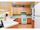 Functional kitchen with ample counter space, modern appliances, and bright cabinetry, offering a comfortable cooking environment at 1640 Donovans Nw Rdg, Kennesaw, GA 30152