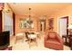 Well-lit living room featuring a dining area, pass-through, and comfortable seating at 1640 Donovans Nw Rdg, Kennesaw, GA 30152