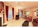 Spacious living room with a fireplace, comfortable seating, and a view to the kitchen at 1640 Donovans Nw Rdg, Kennesaw, GA 30152