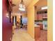 Open-concept living area with dining space and partial view of the kitchen, perfect for entertaining and Gathering gatherings at 1640 Donovans Nw Rdg, Kennesaw, GA 30152