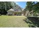 Charming two-story brick home with manicured lawn and inviting walkway, offers a warm and welcoming curb appeal at 375 Beracah Tr Southwest Sw Trl, Atlanta, GA 30331