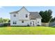 Spacious backyard with lush lawn and fenced perimeter, providing privacy and room for outdoor activities at 2837 Lakewater Way, Snellville, GA 30039