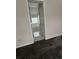 En-suite bathroom featuring soaking tub in a bright space with ceramic tile at 2837 Lakewater Way, Snellville, GA 30039