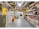 Spacious unfinished basement with shelving, exposed ceiling, and ample storage possibilities at 3333 N Hembree Rd, Marietta, GA 30062
