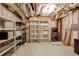 Unfinished basement with open ceiling, shelving and concrete floors offers plenty of potential at 3333 N Hembree Rd, Marietta, GA 30062