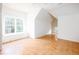 Bright bedroom with natural light, vaulted ceilings, and wood-look tile flooring at 3333 N Hembree Rd, Marietta, GA 30062