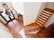 View from above the front foyer shows the beautiful dark hardwood floors and chandelier at 3333 N Hembree Rd, Marietta, GA 30062