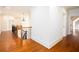 Hallway showcasing wood floors and iron-wood banister at 3333 N Hembree Rd, Marietta, GA 30062