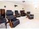 Cozy home theater with reclining chairs, projector, and built-in speakers for an immersive experience at 3333 N Hembree Rd, Marietta, GA 30062
