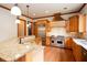 Spacious kitchen featuring stainless steel appliances, a center island, and custom wood cabinets at 3333 N Hembree Rd, Marietta, GA 30062