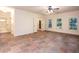 Spacious living room showcasing slate tile flooring, natural light, and neutral paint at 3333 N Hembree Rd, Marietta, GA 30062