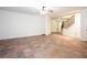 Open living room features slate tile flooring, staircase, and abundant natural light at 3333 N Hembree Rd, Marietta, GA 30062