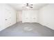 Neutral room with multiple closets, doors, and modern ceiling fan at 3333 N Hembree Rd, Marietta, GA 30062