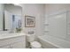 Bright, modern bathroom with sleek vanity and bathtub/shower combo at 3352 Cranston Ln, Kennesaw, GA 30144