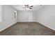 Spacious bedroom features neutral paint and carpet flooring at 752 Roxboro Trce, Lawrenceville, GA 30044