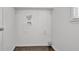 Unfinished laundry room with shelf, tile floor, and washer and dryer hookups at 752 Roxboro Trce, Lawrenceville, GA 30044