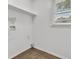 Tiled laundry room with natural light at 752 Roxboro Trce, Lawrenceville, GA 30044