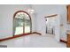 Cozy breakfast nook features a large arched window and access to the laundry room at 98 Country Acres Ct, Mcdonough, GA 30253