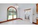 Cozy breakfast nook with large arched windows and a laundry area at 98 Country Acres Ct, Mcdonough, GA 30253