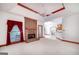 Living room with a fireplace, unique ceilings, carpeted floors, and bright white walls at 98 Country Acres Ct, Mcdonough, GA 30253