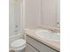 Bathroom features a sink, toilet, and tub, ready for relaxation and convenience at 1626 Palladian Way, Lithonia, GA 30058