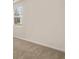 Bedroom displaying neutral carpet and a bright window, creating a serene retreat at 1626 Palladian Way, Lithonia, GA 30058