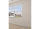 Bedroom showcasing a bright window and neutral carpet for a relaxing atmosphere at 1626 Palladian Way, Lithonia, GA 30058