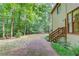 Landscaped backyard with brick pathways leading to the house at 4975 Duncans Lake Dr, Buford, GA 30519