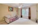 Relaxing bedroom with natural light and comfortable seating at 4975 Duncans Lake Dr, Buford, GA 30519