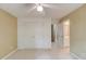 Bedroom featuring closet with double doors and ensuite bathroom at 4975 Duncans Lake Dr, Buford, GA 30519
